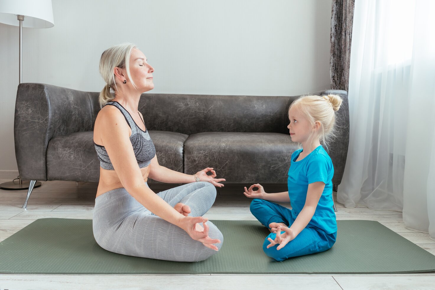 woman meditating with child